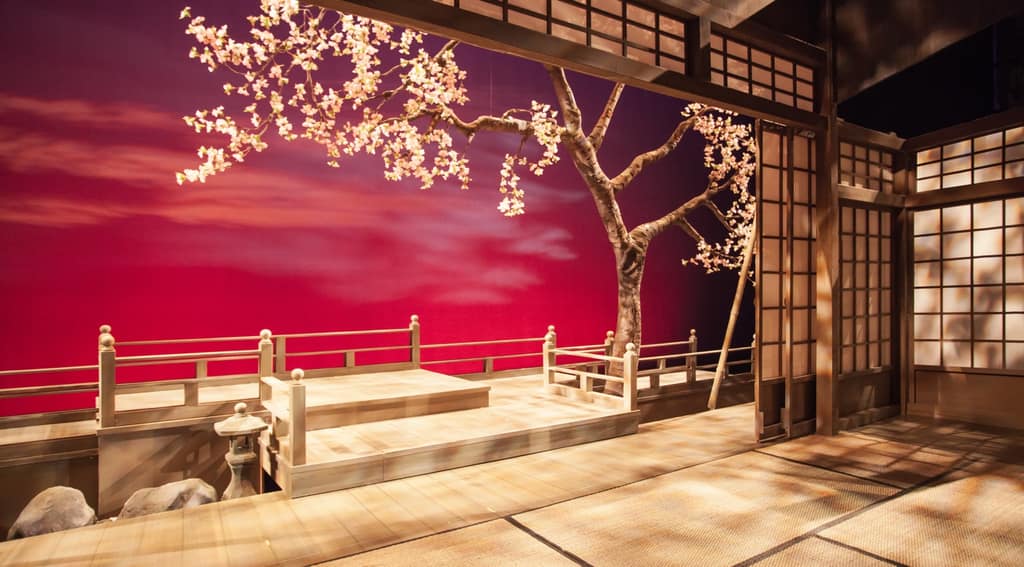 A cherry-blossom stage set on the Queen Elizabeth Theatre stage