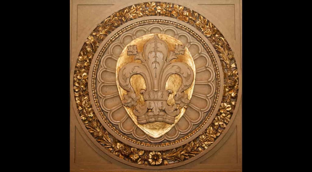 A gilded fleur-de-lis medallion in the Orpheum